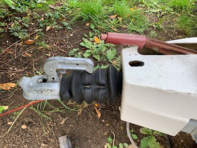 Caravan tow hitch inspection during an annual service